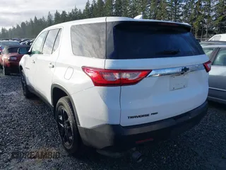 2020 Chevrolet Traverse LS with VIN 1GNEVFKW9LJ100826, listed as a IAAI auction lot 41227311 with 77,327 mi miles. Bid and sale history available at carsss.com. Image 3.