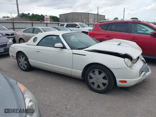 2002 Ford Thunderbird w/Hardtop Premium with VIN 1FAHP60A62Y127579, listed as a IAAI auction lot 42035019 with 98,582 mi miles. Bid and sale history available at carsss.com. Image 13.