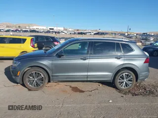 2018 Volkswagen Tiguan SEL z VIN 3VV3B7AXXJM088230, wystawiony jako IAAI lot #41680855 z przebiegiem 130 807 mil mil oraz . Historia ofert i sprzedaży dostępna na DreamBid. Obrazek 14.