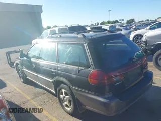 1998 Subaru Legacy Outback with VIN 4S3BG6856W7608371, listed as a IAAI auction lot 42522025 with 216,491 mi miles and . Bid and sale history available at DreamBid. Image 3.