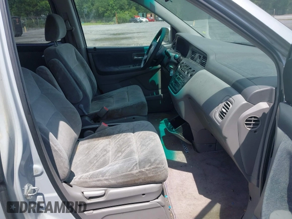 2002 Honda Odyssey EX z VIN 2HKRL18692H526842, wystawiony jako IAAI lot #42495810 z przebiegiem 220 289 mil mil oraz . Historia ofert i sprzedaży dostępna na DreamBid. Obrazek 5.