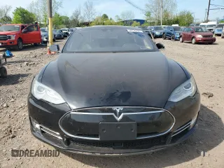 2016 Tesla Model S 90D with VIN 5YJSA1E28GF131212, listed as a Copart auction lot 54176705 with 97,373 mi miles and Salvage Title. Bid and sale history available at DreamBid. Image 5.