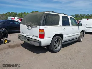2003 Chevrolet Tahoe LS with VIN 1GNEC13ZX3R281468, listed as a IAAI auction lot 41911693 with 149,387 mi miles. Bid and sale history available at carsss.com. Image 4.