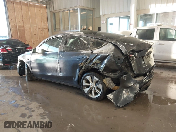 2023 Tesla Model Y Long Range with VIN 7SAYGDEE5PA033341, listed as a IAAI auction lot 41379625 with Not provided miles and . Bid and sale history available at DreamBid. Image 3.