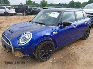 2021 MINI Hardtop 4 Door Cooper S with VIN WMWXU9C00M2N60370, listed as a IAAI auction lot 42426257 with 11,288 mi miles and . Bid and sale history available at DreamBid. Image 17.