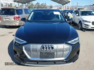 2019 Audi e-tron Premium Plus with VIN WA1LAAGE9KB021724, listed as a IAAI auction lot 41643596 with 34,804 mi miles. Bid and sale history available at carsss.com. Image 12.