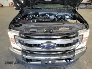 2020 Ford F-250 XL z VIN 1FT7W2B67LEE16175, wystawiony jako Copart lot #70740105 z przebiegiem 117 541 mil mil oraz Czysty tytuł • Clean title. Historia ofert i sprzedaży dostępna na DreamBid. Obrazek 13.