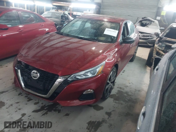 2021 Nissan Altima 2.5 SR with VIN 1N4BL4CV4MN316661, listed as a IAAI auction lot 40865466 with 74,304 mi miles. Bid and sale history available at carsss.com. Image 2.
