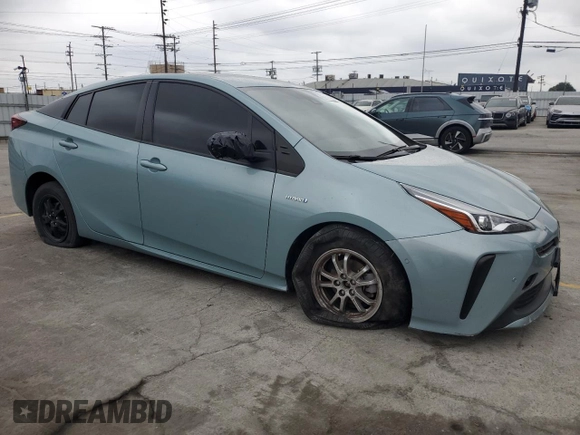 2021 Toyota Prius L Eco with VIN JTDKAMFU4M3136370, listed as a Copart auction lot 53513905 with 63,165 mi miles and Salvage title. Bid and sale history available at DreamBid. Image 4.