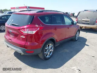 2015 Ford Escape SE with VIN 1FMCU0GXXFUA57386, listed as a IAAI auction lot 42043058 with 107,635 mi miles. Bid and sale history available at carsss.com. Image 4.