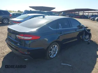 2020 Ford Fusion SE with VIN 3FA6P0HDXLR168137, listed as a IAAI auction lot 42128526 with 114,937 mi miles and . Bid and sale history available at DreamBid. Image 4.