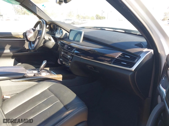2018 BMW X5 xDrive40e iPerformance with VIN 5UXKT0C53J0W00910, listed as a IAAI auction lot 41842046 with 48,838 mi miles. Bid and sale history available at carsss.com. Image 5.