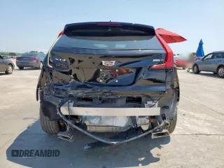2023 Cadillac XT4 FWD Luxury z VIN 1GYAZAR42PF102696, wystawiony jako Copart lot #60524065 z przebiegiem 1 903 mil mil oraz Szkoda całkowita • Salvage title. Historia ofert i sprzedaży dostępna na DreamBid. Obrazek 6.