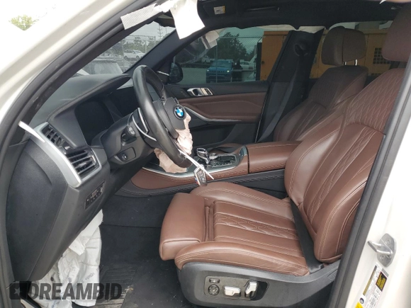 2020 BMW X5 M50i with VIN 5UXJU4C00LLE46181, listed as a Copart auction lot 66190794 with Not Provided miles and Salvage Title. Bid and sale history available at DreamBid. Image 7.