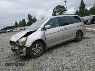 2007 Honda Odyssey EX with VIN 5FNRL38497B414039, listed as a Copart auction lot 62680375 with 40,027 mi miles and Salvage title. Bid and sale history available at DreamBid. Image 1.