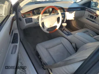 2002 Cadillac Eldorado z VIN 1G6EL12Y12B100821, wystawiony jako Copart lot #83495214 z przebiegiem 36 358 mil mil oraz Czysty tytuł • Clean title. Historia ofert i sprzedaży dostępna na DreamBid. Obrazek 8.