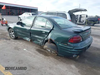 2002 Pontiac Grand Am SE1 with VIN 1G2NF52FX2C165546, listed as a IAAI auction lot 41290065 with 149,834 mi miles. Bid and sale history available at carsss.com. Image 3.