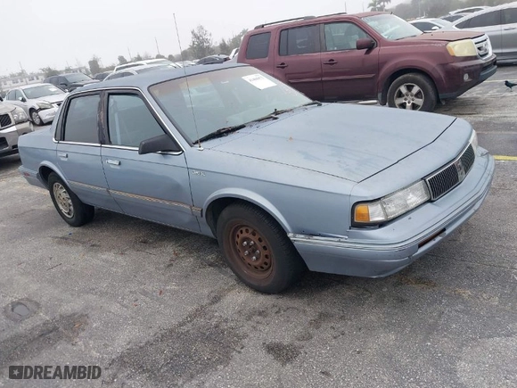 1996 Oldsmobile Ciera 1SA + VX5 with VIN 1G3AJ55MXT6363966, listed as a IAAI auction lot 41404473 with NaN miles. Bid and sale history available at carsss.com. Image 1.