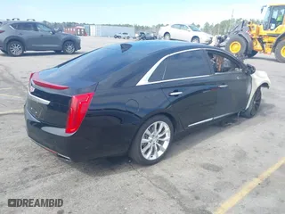2016 Cadillac XTS Luxury Collection with VIN 2G61M5S39G9100596, listed as a IAAI auction lot 41738909 with 114,862 mi miles. Bid and sale history available at carsss.com. Image 4.