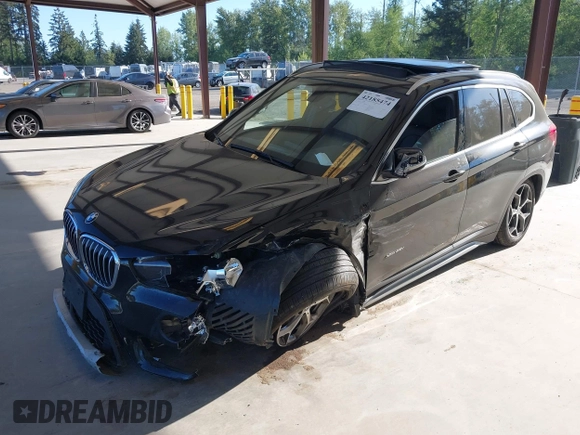 2018 BMW X1 xDrive28i z VIN WBXHT3C35J5L25056, wystawiony jako IAAI lot #42185474 z przebiegiem 62 631 mil mil oraz . Historia ofert i sprzedaży dostępna na DreamBid. Obrazek 17.