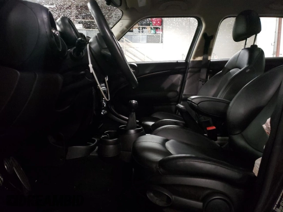 2015 MINI Cooper Countryman S with VIN WMWZC5C51FWM18945, listed as a Copart auction lot 45018755 with 135,086 mi miles and Salvage Title. Bid and sale history available at carsss.com. Image 7.