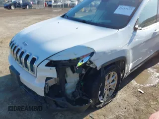 2015 Jeep Cherokee Latitude with VIN 1C4PJLCBXFW506502, listed as a IAAI auction lot 42103117 with 160,433 mi miles and . Bid and sale history available at carsss.com. Image 6.