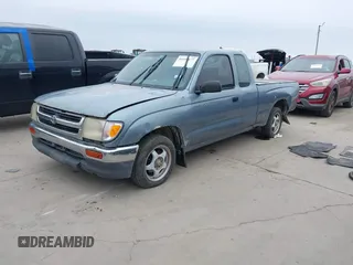 1997 Toyota Tacoma with VIN 4TAVL52N0VZ311543, listed as a IAAI auction lot 41644677 with 292,131 mi miles. Bid and sale history available at carsss.com. Image 18.