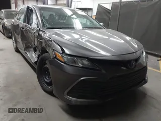 2021 Toyota Camry Hybrid LE with VIN 4T1C31AK7MU559730, listed as a IAAI auction lot 41851492 with 47,356 mi miles. Bid and sale history available at carsss.com. Image 1.