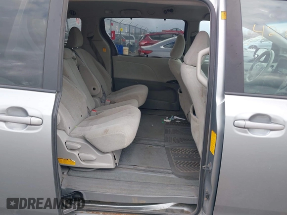 2011 Toyota Sienna LE AAS with VIN 5TDKK3DC8BS051934, listed as a IAAI auction lot 42040204 with 207,863 mi miles. Bid and sale history available at carsss.com. Image 8.