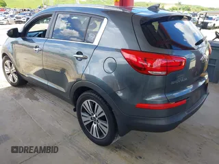 2014 Kia Sportage EX with VIN KNDPC3AC9E7608081, listed as a IAAI auction lot 42758471 with 255,381 mi miles and . Bid and sale history available at DreamBid. Image 3.