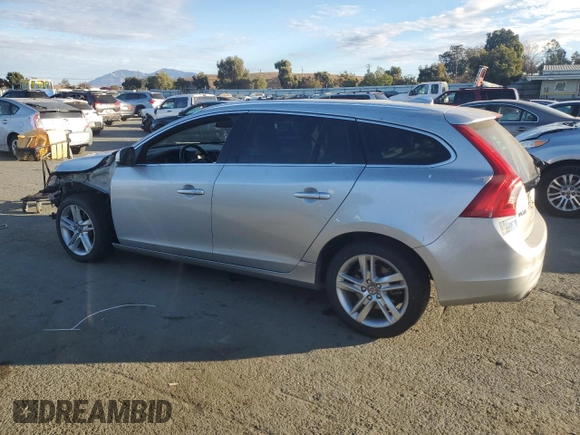 2015 Volvo V60 z VIN YV1612SB6F1211119, wystawiony jako Copart lot #77466004 z przebiegiem 144 388 mil mil oraz Szkoda całkowita • Salvage title. Historia ofert i sprzedaży dostępna na DreamBid. Obrazek 2.
