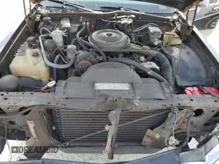 1985 Oldsmobile 88 z VIN 1G3BV69Y1FY384631, wystawiony jako Copart lot #43389795 z przebiegiem 180 641 mil mil oraz Szkoda całkowita • Salvage title. Historia ofert i sprzedaży dostępna na DreamBid. Obrazek 11.