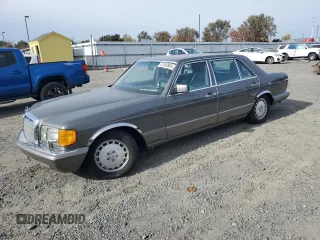 1990 Mercedes-Benz 560 with VIN WDBCA39E3LA553622, listed as a Copart auction lot 81530904 with 142,614 mi miles and Clean Title. Bid and sale history available at DreamBid. Image 1.