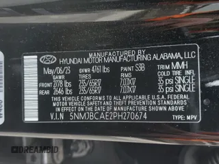 2023 Hyundai Tucson SEL with VIN 5NMJBCAE2PH270674, listed as a Copart auction lot 82879614 with 11,673 mi miles and Salvage Title. Bid and sale history available at DreamBid. Image 13.