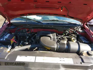 2000 Ford F-150 XL with VIN 1FTRX17L7YKA59717, listed as a IAAI auction lot 40887691 with 104,095 mi miles. Bid and sale history available at carsss.com. Image 10.