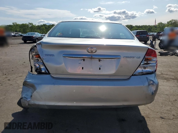 2004 Toyota Camry LE z VIN JTDBE32K640270298, wystawiony jako Copart lot #58800955 z przebiegiem 79 064 mil mil oraz Szkoda całkowita • Salvage title. Historia ofert i sprzedaży dostępna na DreamBid. Obrazek 6.