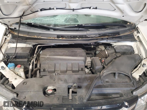 2016 Honda Odyssey Touring Elite with VIN 5FNRL5H91GB070424, listed as a Copart auction lot 55583075 with 115,709 mi miles and Salvage Title. Bid and sale history available at DreamBid. Image 12.