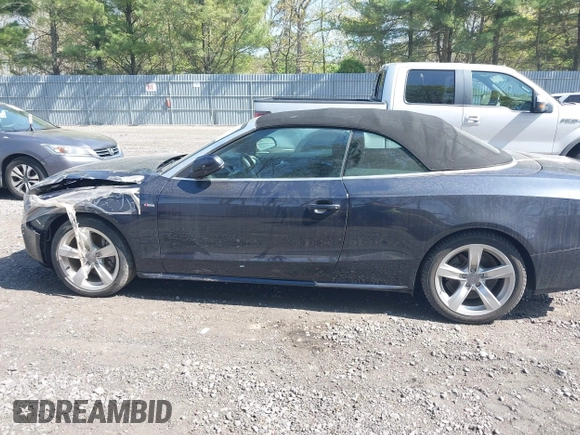 2016 Audi A5 Premium Plus with VIN WAUM2AFH2GN005516, listed as a IAAI auction lot 42181132 with 60,280 mi miles. Bid and sale history available at carsss.com. Image 14.