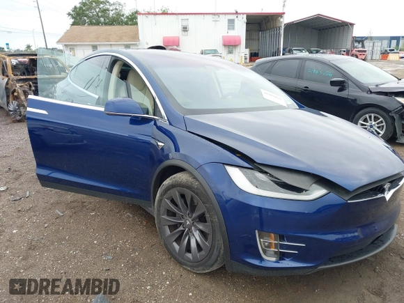 2018 Tesla Model X 75D with VIN 5YJXCAE2XJF111180, listed as a IAAI auction lot 41988079 with 114,593 mi miles and . Bid and sale history available at DreamBid. Image 1.