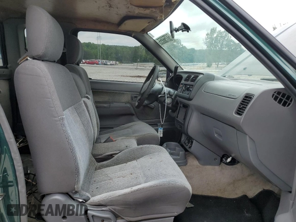 2000 Nissan Frontier XE with VIN 1N6DD26SXYC400648, listed as a Copart auction lot 58756855 with 148,051 mi miles and Salvage title. Bid and sale history available at DreamBid. Image 10.
