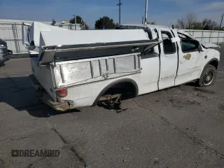 2002 Ford F-150 XL with VIN 1FTRX18L12NA01509, listed as a Copart auction lot 51098435 with Not provided miles and Salvage title. Bid and sale history available at DreamBid. Image 3.