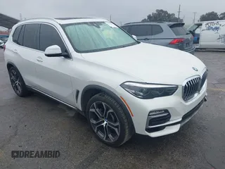 2021 BMW X5 sDrive40i with VIN 5UXCR4C03M9F24817, listed as a IAAI auction lot 41512172 with 54,867 mi miles. Bid and sale history available at carsss.com. Image 1.