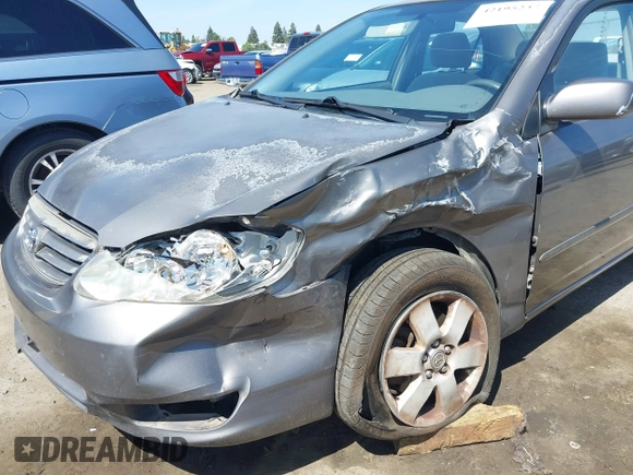2004 Toyota Corolla CE with VIN 1NXBR38E44Z216685, listed as a IAAI auction lot 42195237 with 191,708 mi miles and . Bid and sale history available at DreamBid. Image 6.