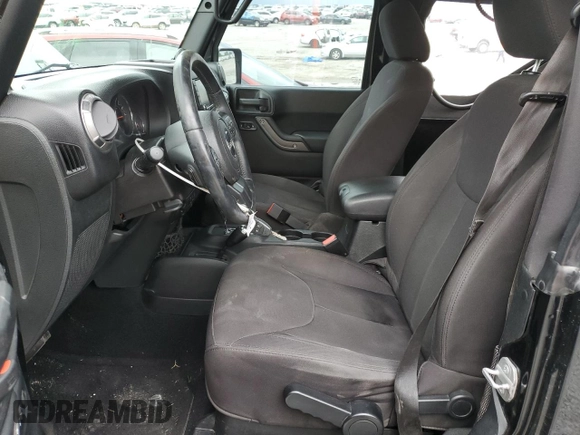 2014 Jeep Wrangler Sport with VIN 1C4AJWAG5EL326480, listed as a Copart auction lot 60653955 with 94,102 mi miles and Salvage title. Bid and sale history available at DreamBid. Image 7.