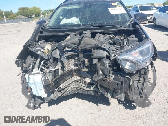 2018 Toyota RAV4 LE with VIN JTMZFREV7JJ207270, listed as a IAAI auction lot 41853828 with 89,179 mi miles. Bid and sale history available at carsss.com. Image 6.