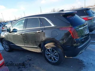 2021 Cadillac XT5 AWD Premium Luxury with VIN 1GYKNDRS2MZ152878, listed as a IAAI auction lot 41347259 with 21,891 mi miles. Bid and sale history available at carsss.com. Image 14.
