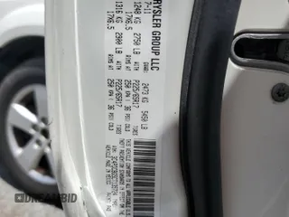 2012 Dodge Journey SXT with VIN 3C4PDCBG5CT135724, listed as a Copart auction lot 56938415 with 180,548 mi miles and Salvage title. Bid and sale history available at DreamBid. Image 13.