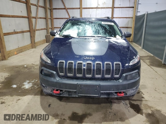 2014 Jeep Cherokee Trailhawk with VIN 1C4PJMBB9EW124371, listed as a Copart auction lot 42038105 with 137,717 mi miles and Salvage Title. Bid and sale history available at carsss.com. Image 5.