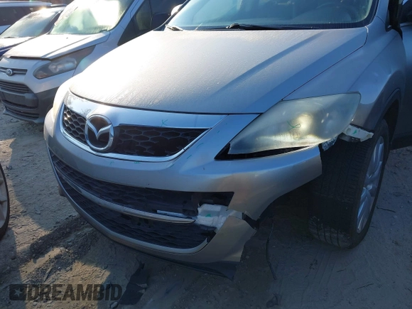 2010 Mazda CX-9 Touring with VIN JM3TB2MA5A0202993, listed as a IAAI auction lot 41654243 with 172,453 mi miles and . Bid and sale history available at DreamBid. Image 6.