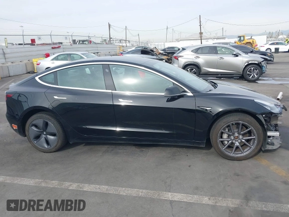 2020 Tesla Model 3 Long Range z VIN 5YJ3E1EB0LF600098, wystawiony jako IAAI lot #41071258 z przebiegiem 149 939 mil mil oraz . Historia ofert i sprzedaży dostępna na DreamBid. Obrazek 14.